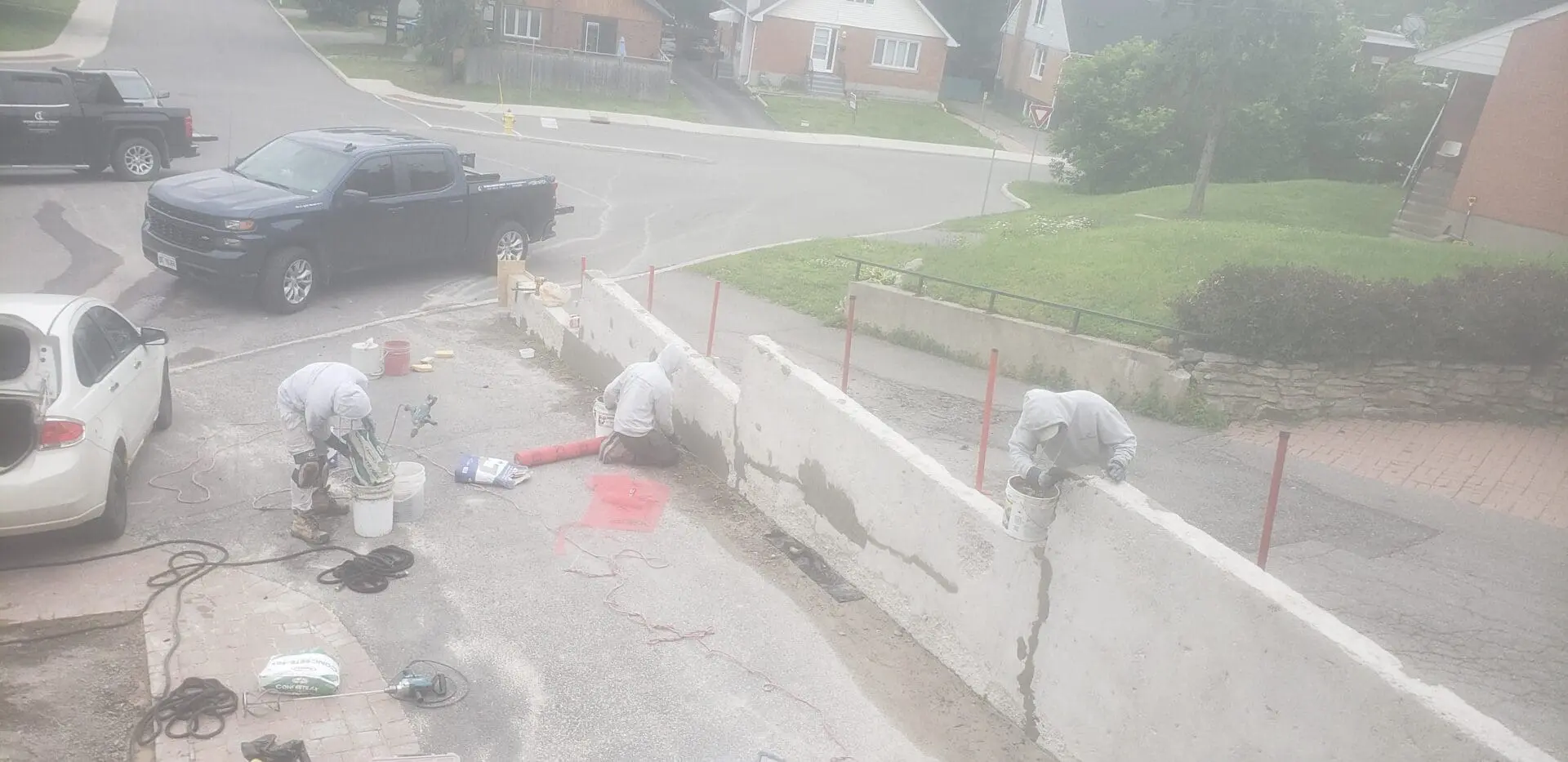 Construction workers making a wall at the site