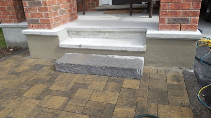 Adding a slab of concrete as an additional step to backdoor deck stairs