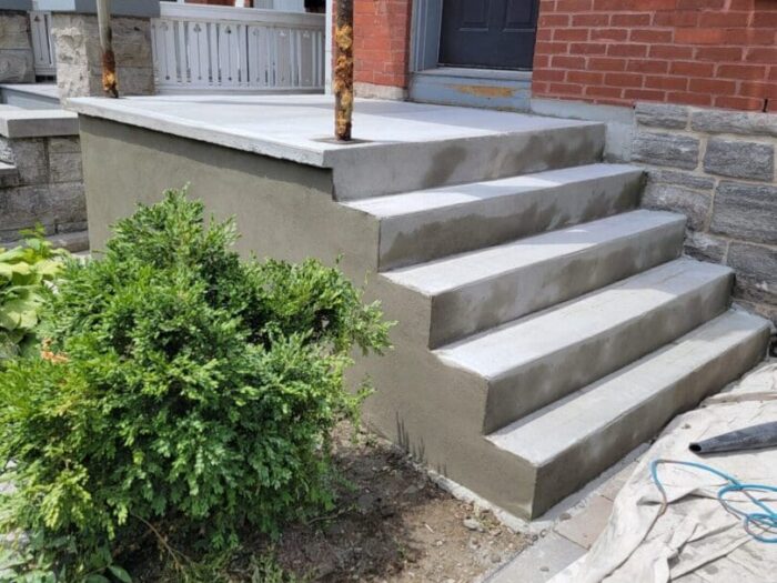 New concrete steps poured at a side entrance
