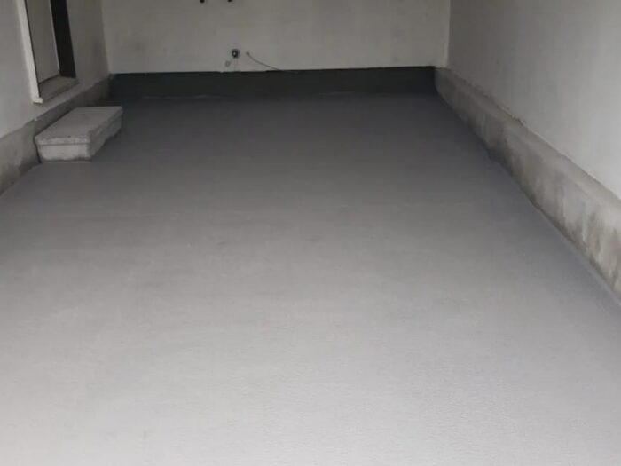 Poured concrete garage floor, freshly finished