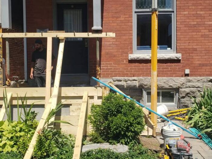 New concrete landing at a side entrance