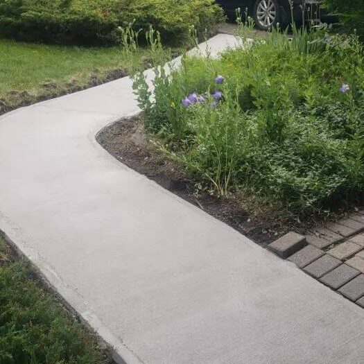 New concrete steps and path to a front door