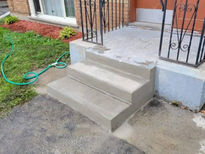 New concrete apron at a commercial entrance