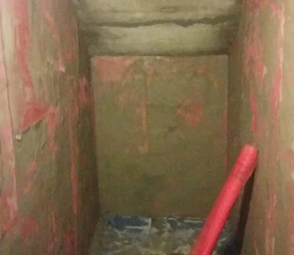 Interior foundation wall exposed during a basement repair