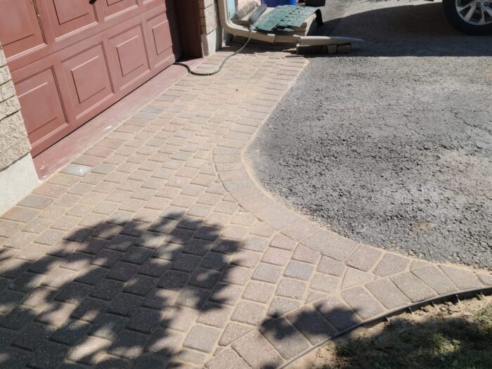 Sunken interlock apron opened up at the garage
