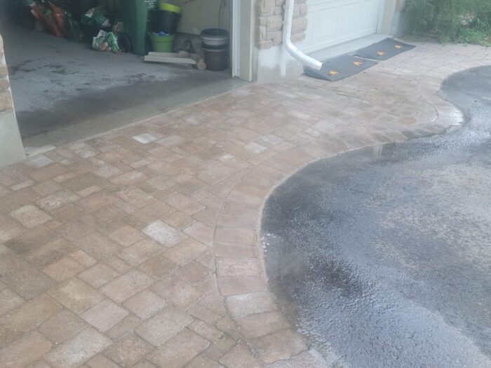 Interlock apron relaid flush with the driveway