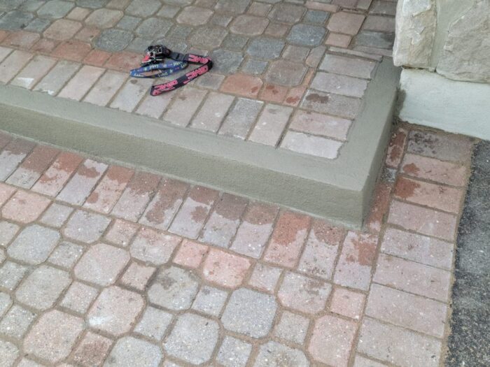 Re-levelled cobble walkway with a new soldier edge