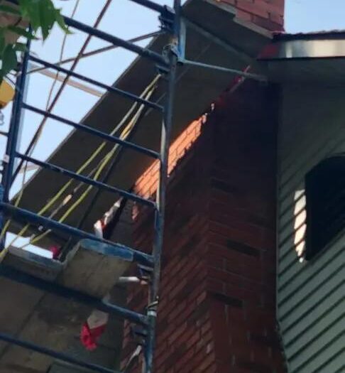 Scaffolding up for a two-storey masonry repair