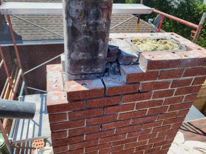 Chimney rebuilt from a sound course up