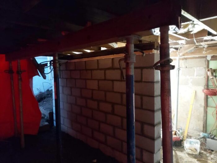 Temporary shoring while a block wall is rebuilt