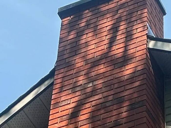 Brick chimney rebuilt on an Ottawa roof