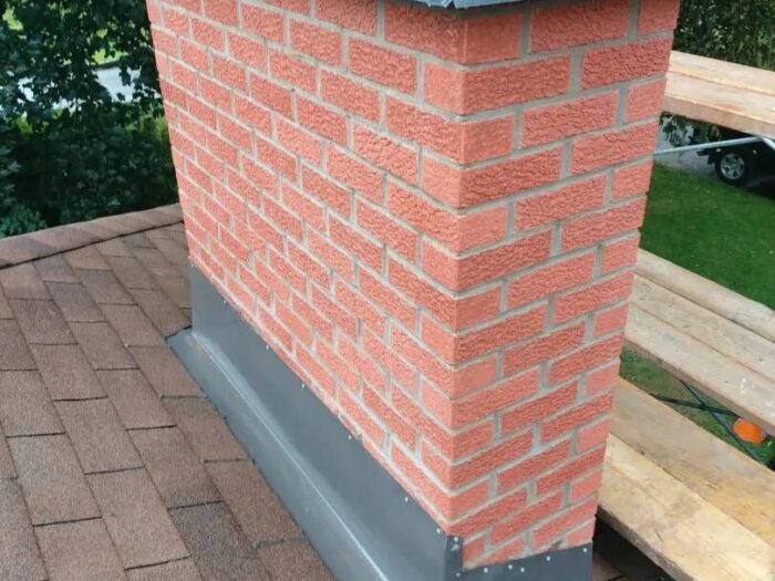 Brick chimney rebuilt on an Ottawa roof