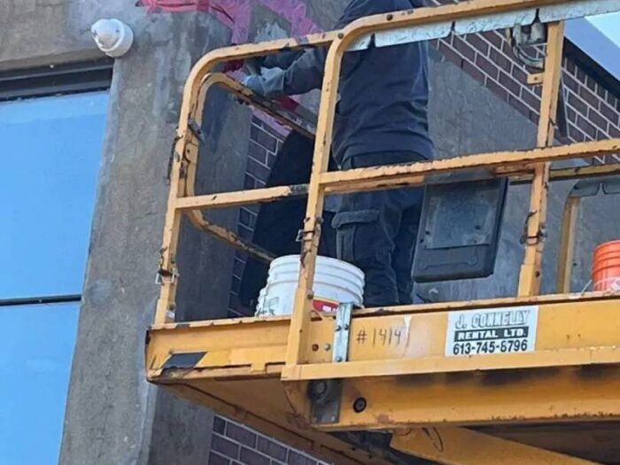 Sealing a concrete panel joint on a commercial building