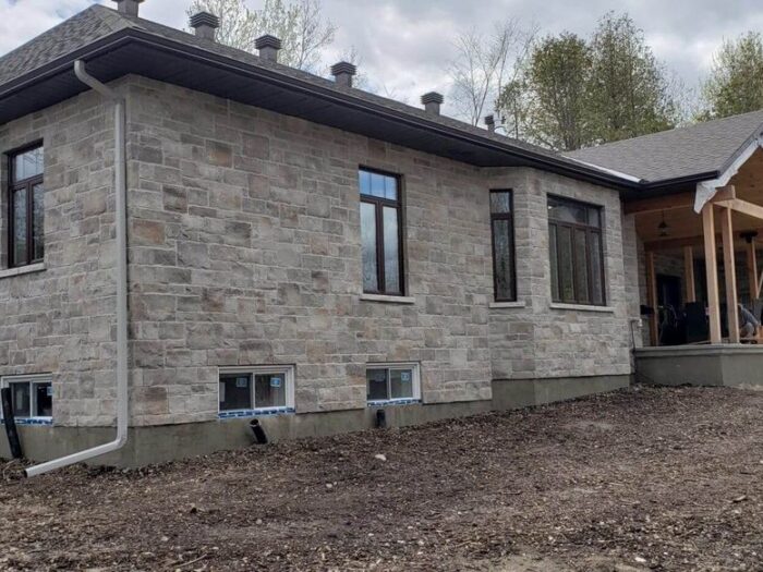 Full around-the-house parging on an Ottawa bungalow