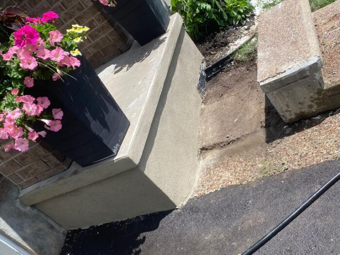 Parged porch side wall and step