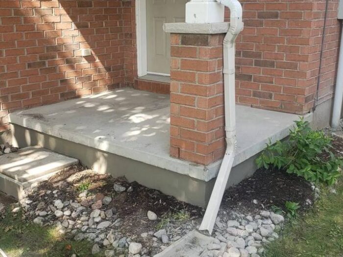 Smooth parging finish below the brick line