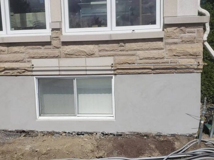 Even parging finish across a whole elevation