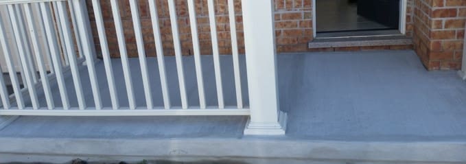 Resurfaced concrete porch landing and column base