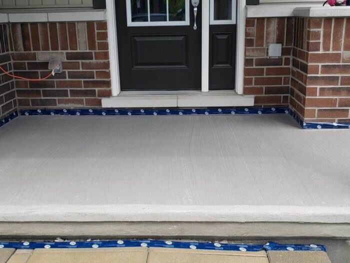 Concrete steps resurfaced and masked to a clean edge