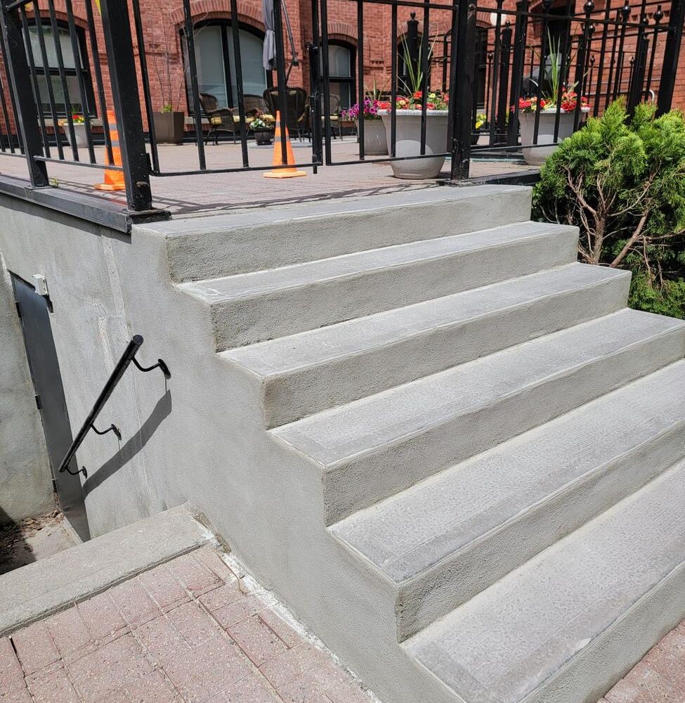 Commercial entrance steps rebuilt and resurfaced