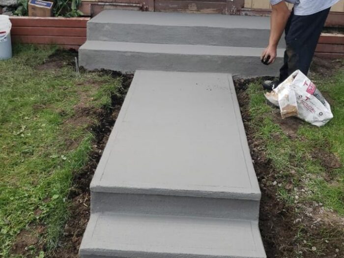 Resurfaced front steps and path to the door