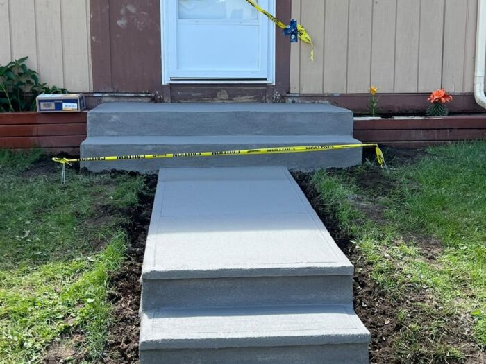 Resurfaced steps and front walkway curing