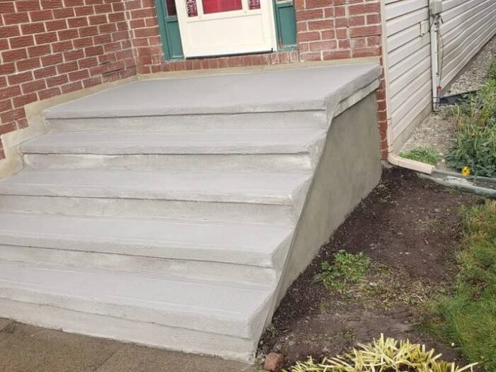 Concrete porch resurfaced to an even finish