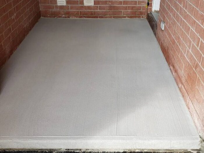 Resurfaced garage floor with a clean edge