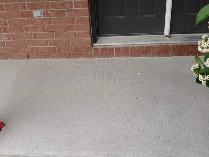 Concrete path resurfaced through a side yard