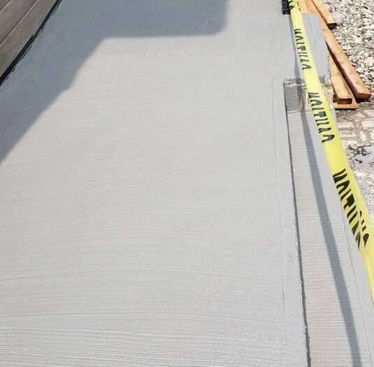 Resurfaced garage floor with a clean edge